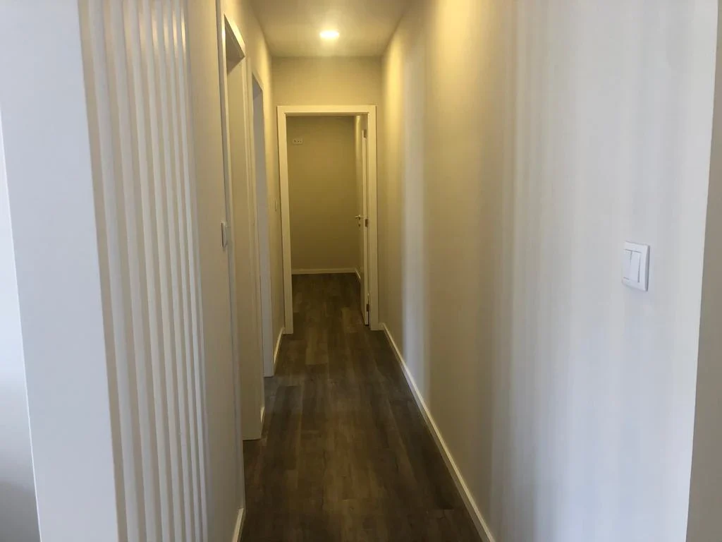 Entrada e circulação interior — Apartamento na Póvoa de Varzim · 2