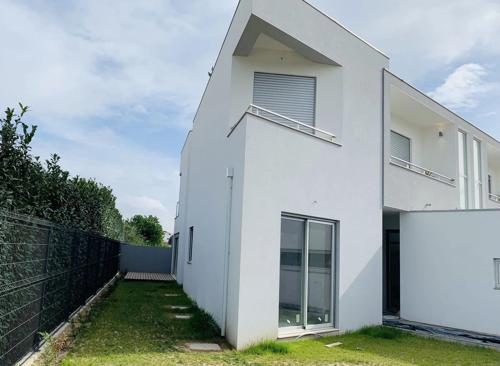 Fachada lateral e jardim — Residências da Lapa